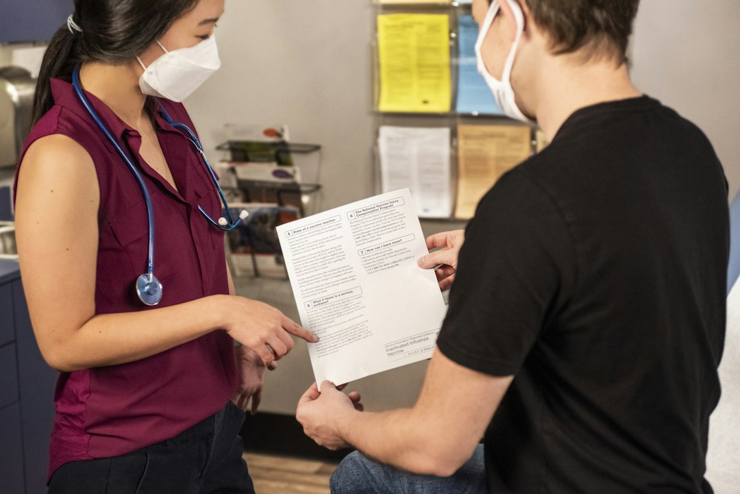 Healthcare provider reviewing medical information with a patient
