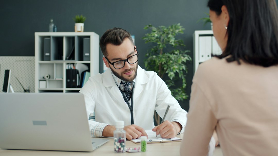 Patient discussing symptoms with a healthcare provider