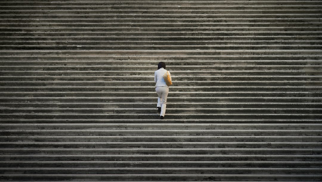Person walking on stairs during an everyday activity